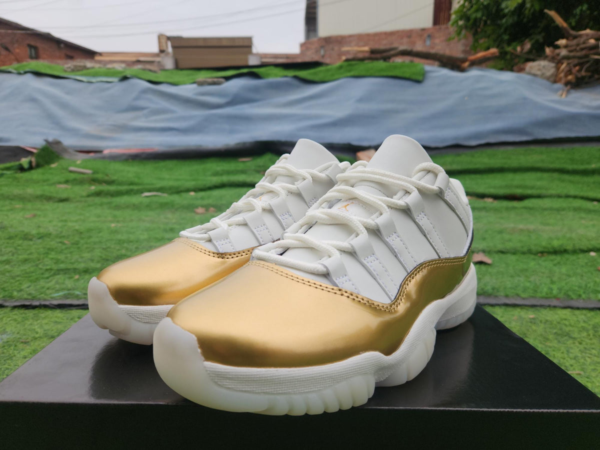 Air Jordan 11 Low White and Gold Sneakers