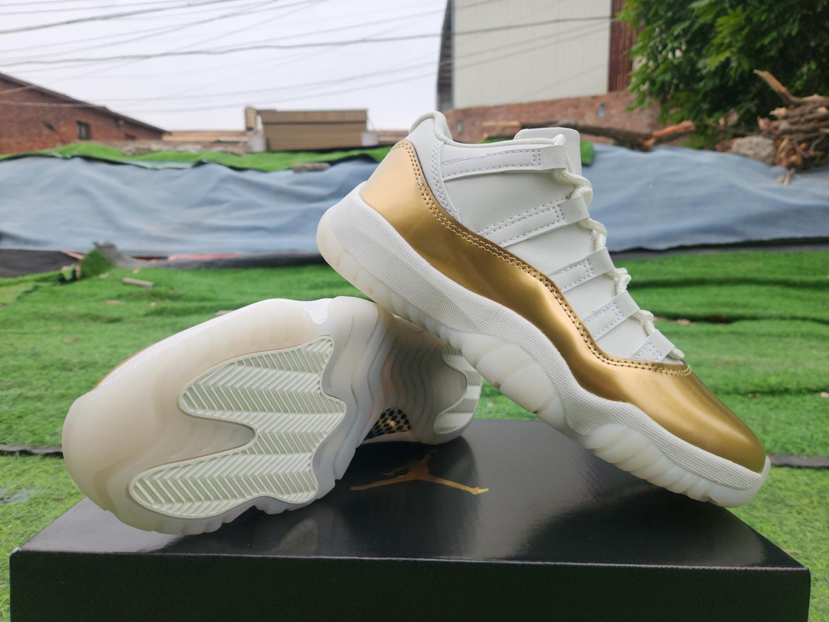 Air Jordan 11 Low White and Gold Sneakers
