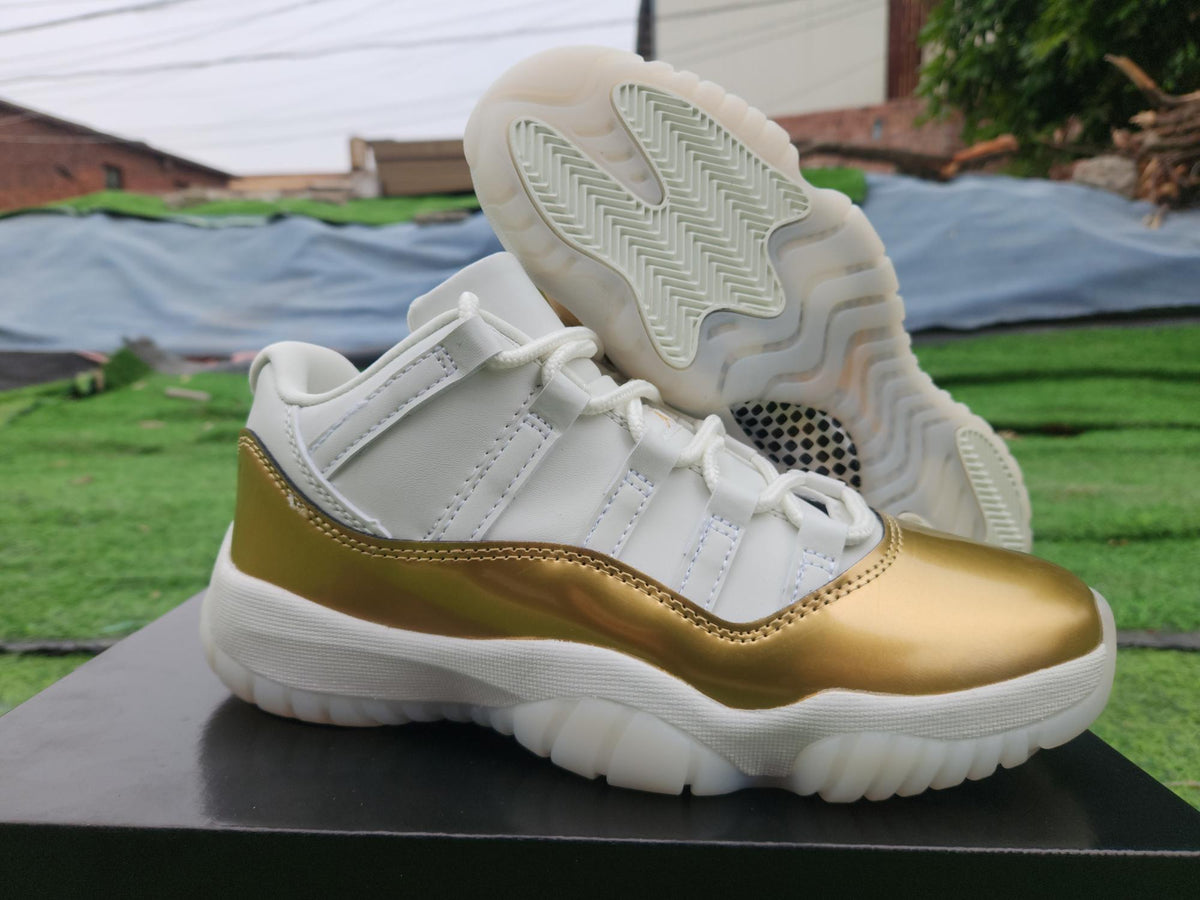 Air Jordan 11 Low White and Gold Sneakers