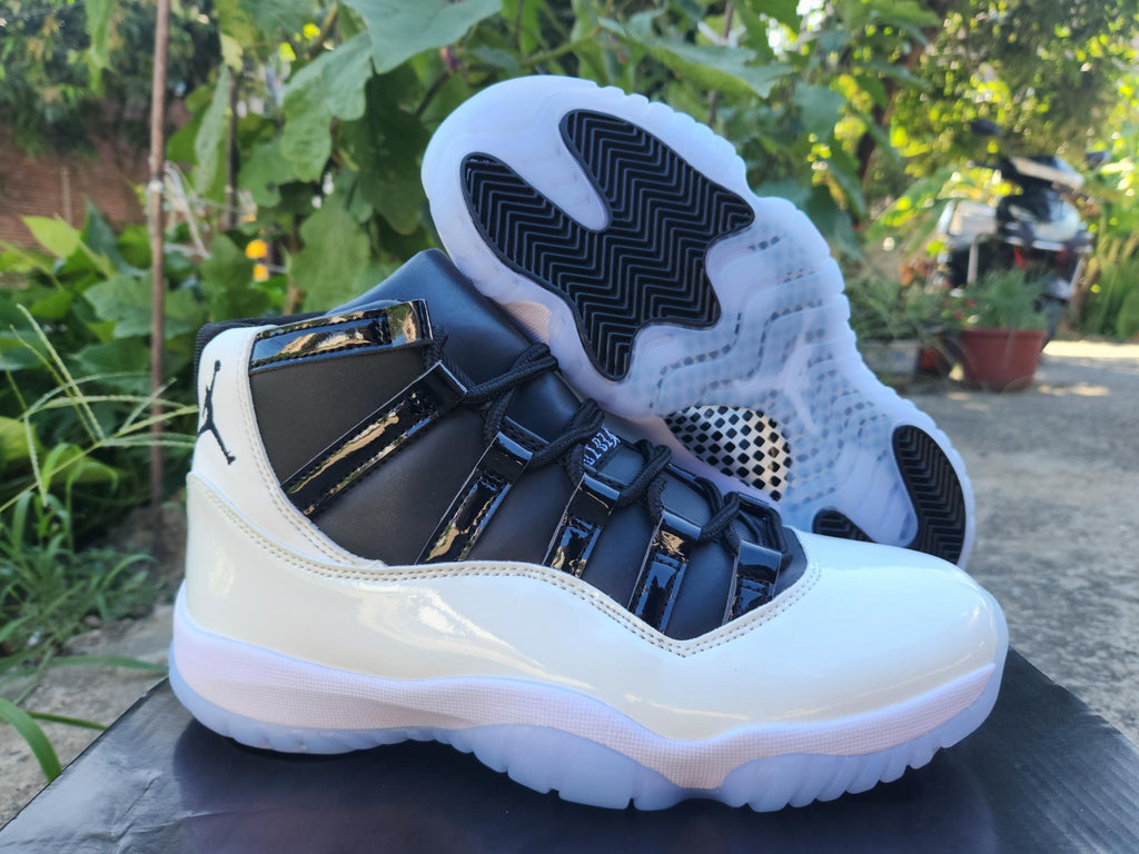 Air Jordan 11 White and Black Sneakers