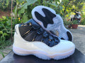 Air Jordan 11 White and Black Sneakers
